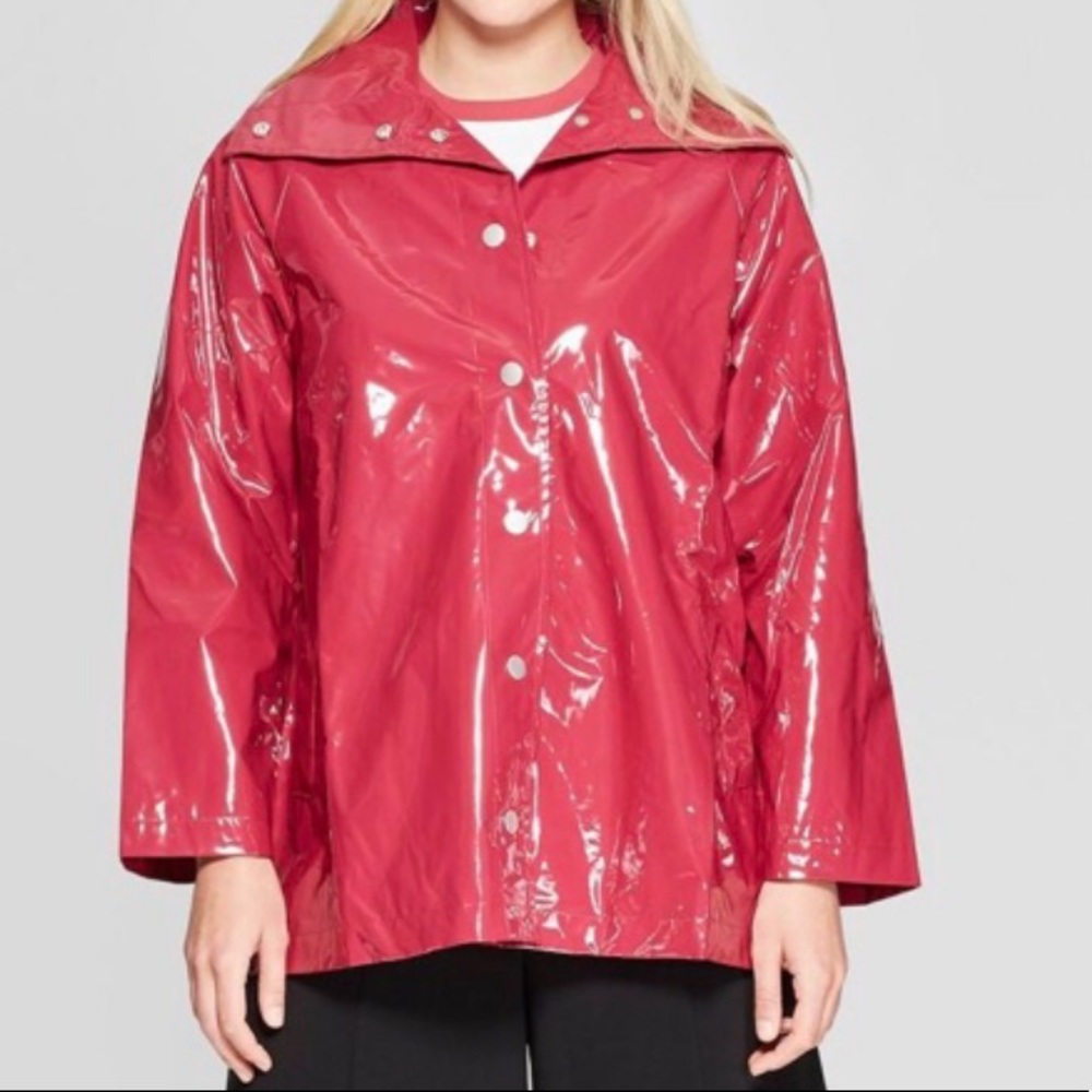 Woman’s Lightweight Raincoat By Who What Wear Runs Big. Fits like a Size 8 Woman